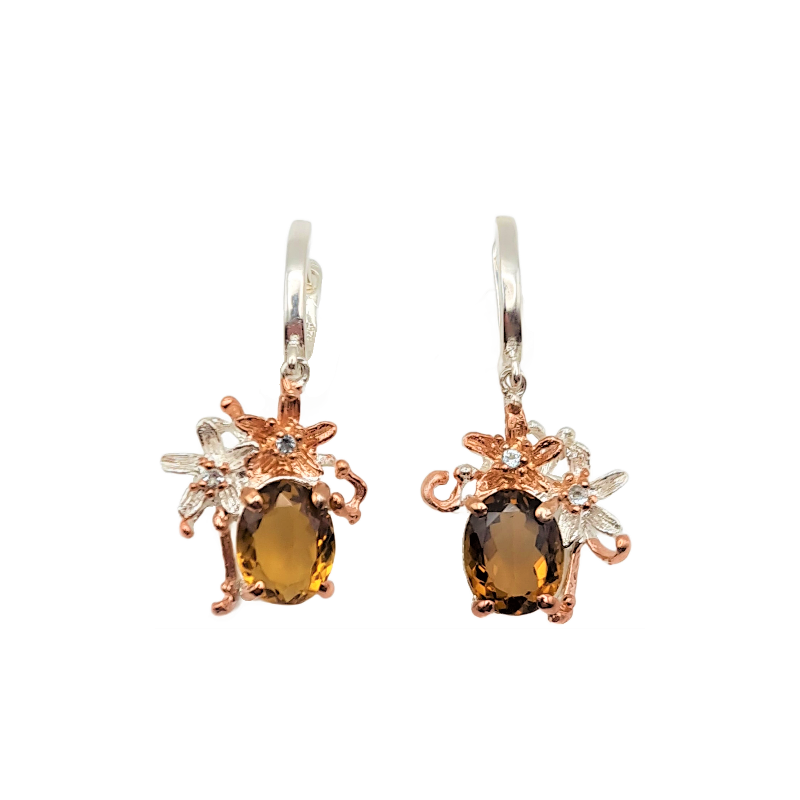 Cercei din argint cu montura de cuart coniac si blue topaz- floare de colt Cercei din argint cu montura de cuart coniac si blue topaz- floare de colt